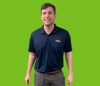 Male SERVPRO Owner on green background