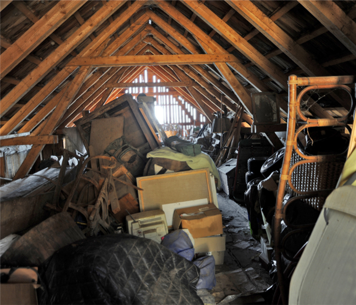 Attic with many items in storage 